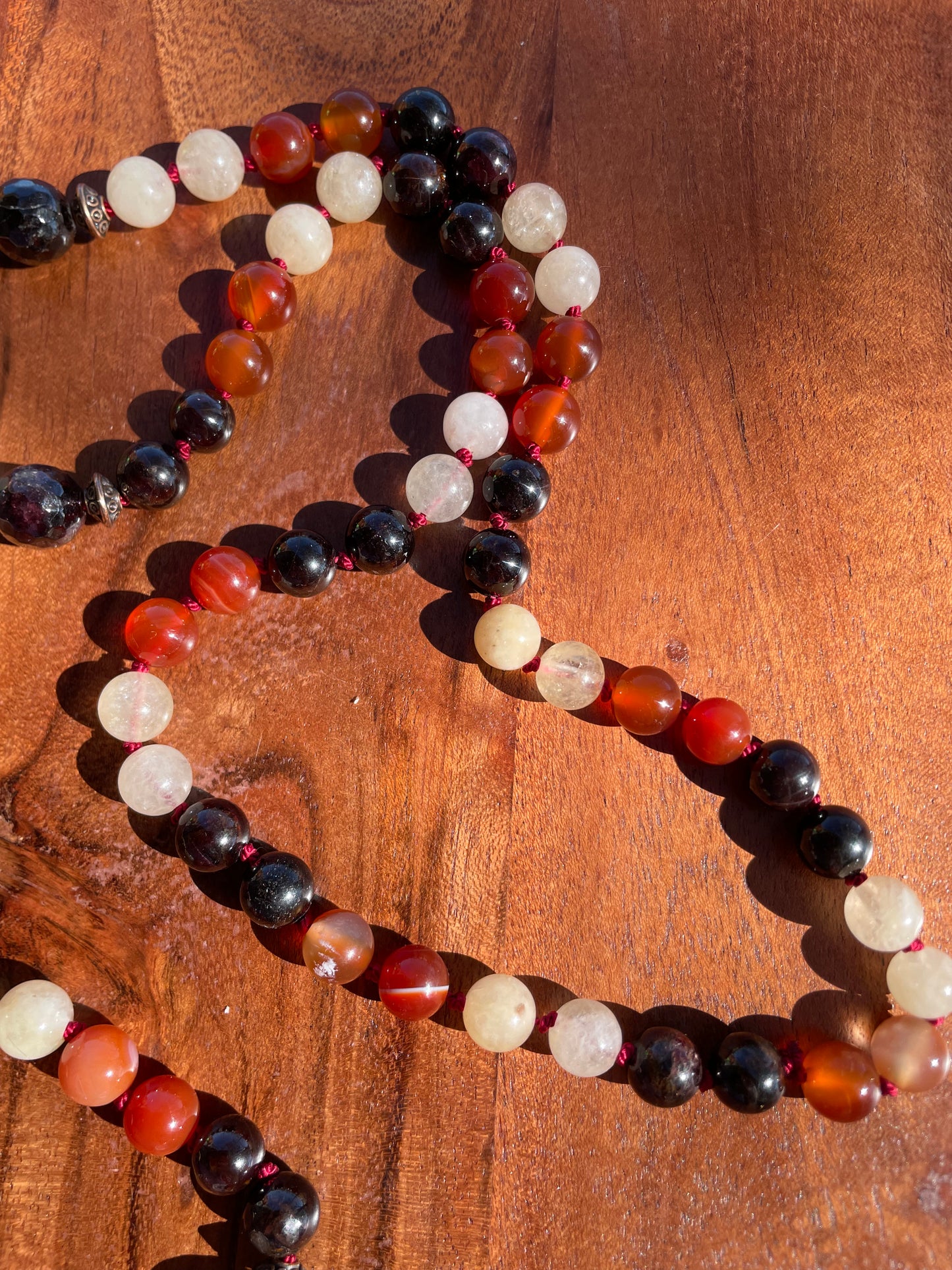 Personal Power Confidence Crystal Mala with Garnet, Carnelian, Yellow Calcite, and Quartz.